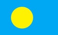 The flag of Palau Flag with offset yellow disc moon and turquoise blue pacific ocean backdrop