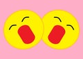 A pair of identical yellow smiley emoticons heads faces with an opened mouth and closed eyes expression light pink rose back