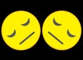 A pair of mirroring bright yellow smiley emoticon faces with sad disappointed expression all black backdrop