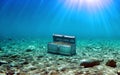 Digitally enhanced image of a treasure chest on an ocean floor background with space for copy Royalty Free Stock Photo