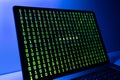 Computer Hacked concept. Laptop screen with hacked word and binary code Royalty Free Stock Photo