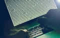 Computer hacker in dark