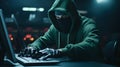 Computer hacker - Male thief stealing data from computer.