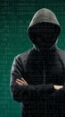 Computer hacker in mask and hoodie over abstract binary background. Obscured dark face. Data thief, internet fraud, darknet and Royalty Free Stock Photo