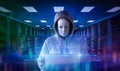 Computer hacker in server room