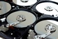 Computer hard disk drive storage memory, repair broken computer part, close up of open hard disc with platters, spindle, actuator Royalty Free Stock Photo