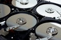 Computer hard disk drive storage memory, repair broken computer part, close up of open hard disc with platters, spindle, actuator Royalty Free Stock Photo