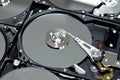 Computer hard disk drive storage memory, repair broken computer part, close up of open hard disc with platters, spindle, actuator Royalty Free Stock Photo