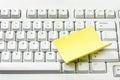 Computer Keyboard and Adhesive Note Paper Royalty Free Stock Photo
