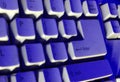Computer keyboard in blue light. Royalty Free Stock Photo