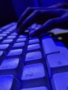 Computer keyboard in blue light. Royalty Free Stock Photo