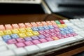 computer keyboard with colored and mixed keys for audio and video editing. professional keyboard with shortcuts to facilitate Royalty Free Stock Photo