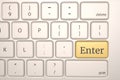 Computer keyboard with gold Enter button, 3D render. 3D illustration Royalty Free Stock Photo