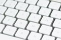 Computer keyboard with keys in the foreground on table Royalty Free Stock Photo