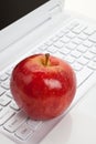 Computer Keyboard and red apple Royalty Free Stock Photo