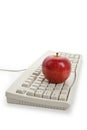 Computer Keyboard and red apple Royalty Free Stock Photo