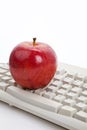 Computer Keyboard and red apple Royalty Free Stock Photo