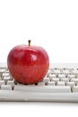 Computer Keyboard and red apple Royalty Free Stock Photo