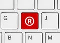 Computer keyboard with Registered mark symbol