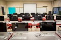 Computer lab room at elementary school with many rows of computers Royalty Free Stock Photo