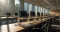 Computer lab classroom with rows of imac computers and chairs for students learning tech skills Royalty Free Stock Photo