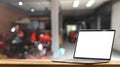 Computer laptop with empty white screen putting on modern wooden table. Royalty Free Stock Photo