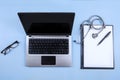 Computer laptop, stethoscope and clipboard 1 Royalty Free Stock Photo