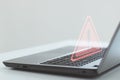 Computer laptop with triangle caution warning sign for notification error and maintenance concept. Royalty Free Stock Photo