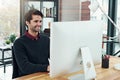 Computer literacy is the new prerequisite skill. a young businessman working on a computer at his desk. Royalty Free Stock Photo