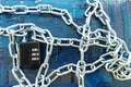 Computer mainboard with chain and padlock, information technology security concept