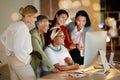 Computer, management and a business woman with her team, working on a deal in the office at night. Collaboration Royalty Free Stock Photo