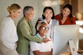 Computer, management and a business woman with her team, working in the office while laughing or joking. Collaboration Royalty Free Stock Photo