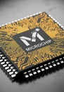 A computer microchip with a black and gold design is depicted. The microchip Royalty Free Stock Photo