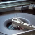 A computer microchip wafer being manufactured