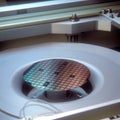 A computer microchip wafer being manufactured