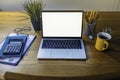 Computer mockup white background on desk. Laptop with white screen Royalty Free Stock Photo