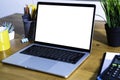 Computer mockup white background on desk. Laptop with white screen Royalty Free Stock Photo