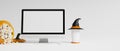 Computer monitor blank screen mockup, and halloween accessories Royalty Free Stock Photo