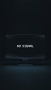 Computer monitor displaying no signal text message Royalty Free Stock Photo