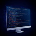 A computer monitor displays lines of colorful programming code against a dark