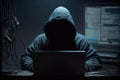 computer monitor with flickering lights and hooded hacker in the dark room, typing on keyboard Royalty Free Stock Photo