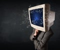 Computer monitor screen exploding on a young persons head Royalty Free Stock Photo