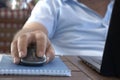 Computer mouse close-up male hand. Royalty Free Stock Photo