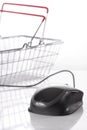 Computer mouse connected to shopping basket Royalty Free Stock Photo