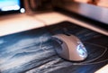 Computer mouse on mousepad bokeh backdrop