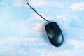 Computer mouse on office desk, top view Royalty Free Stock Photo