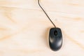 Computer mouse on office desk, top view Royalty Free Stock Photo
