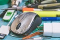 Computer mouse and other objects placed chaotically on the table Royalty Free Stock Photo