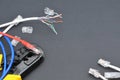 Network cable crimper, switch and cable on the black flat lay background with copy space Royalty Free Stock Photo