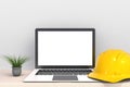 Computer Network Connection Digital Technology, Safety helmet with laptop computer white blank screen on wood work table front vie Royalty Free Stock Photo